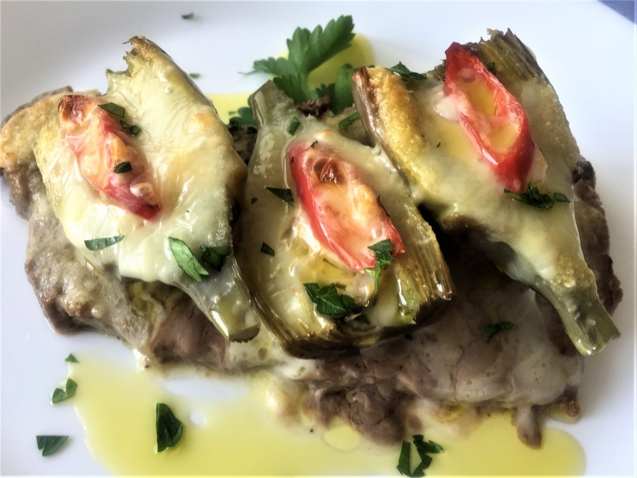 Entrecôte gratinata ai carciofi