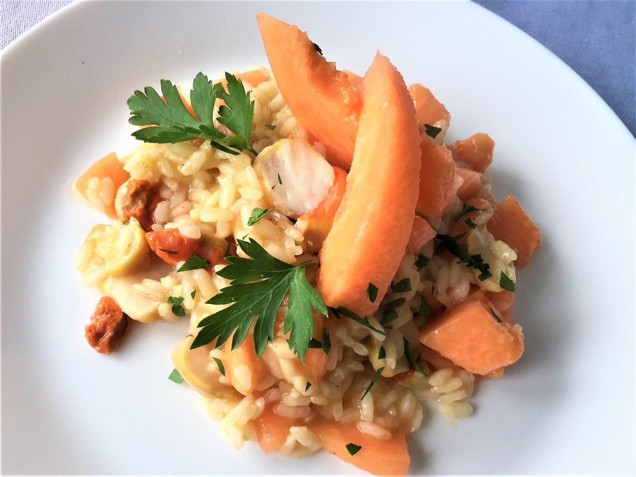 Risotto con capesante e melone
