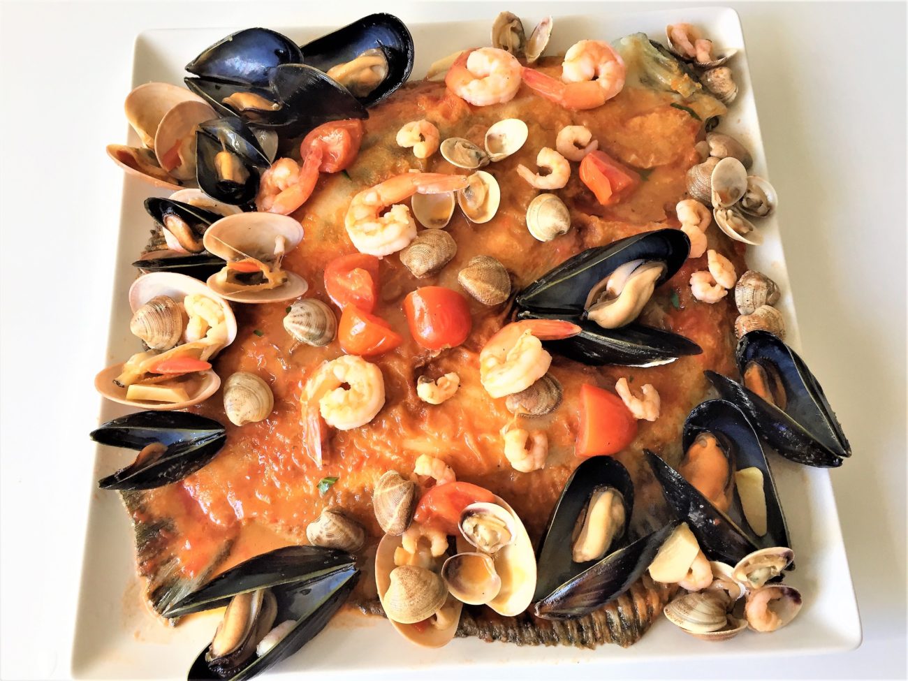 Rombo al forno con frutti di mare