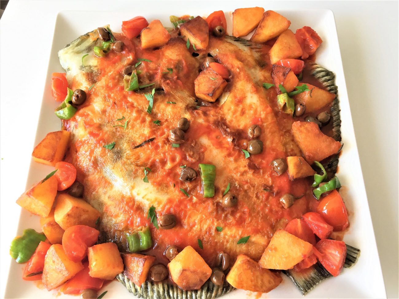 Rombo al forno con patate e olive