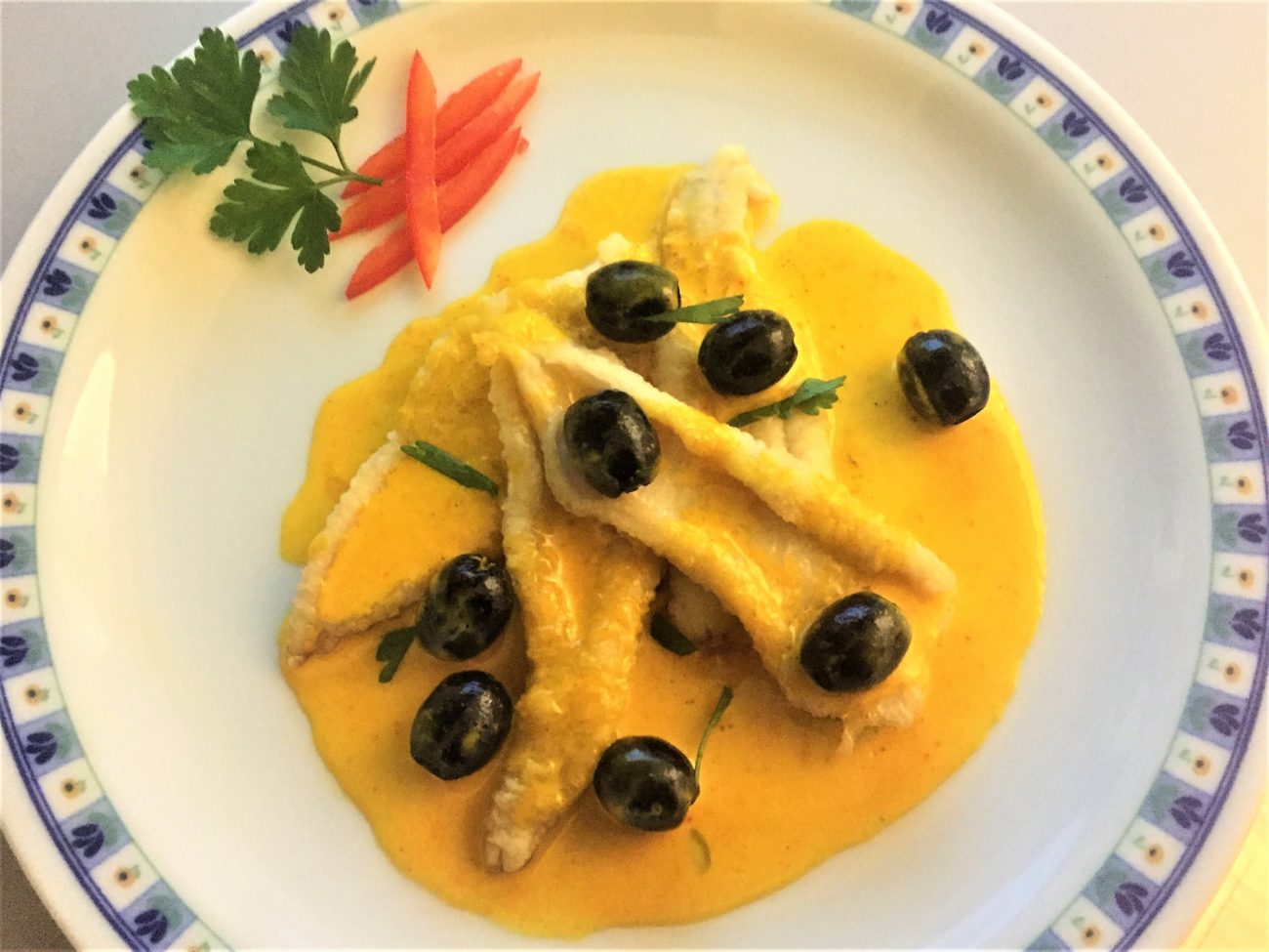 Filetto di sogliola con olive e zafferano