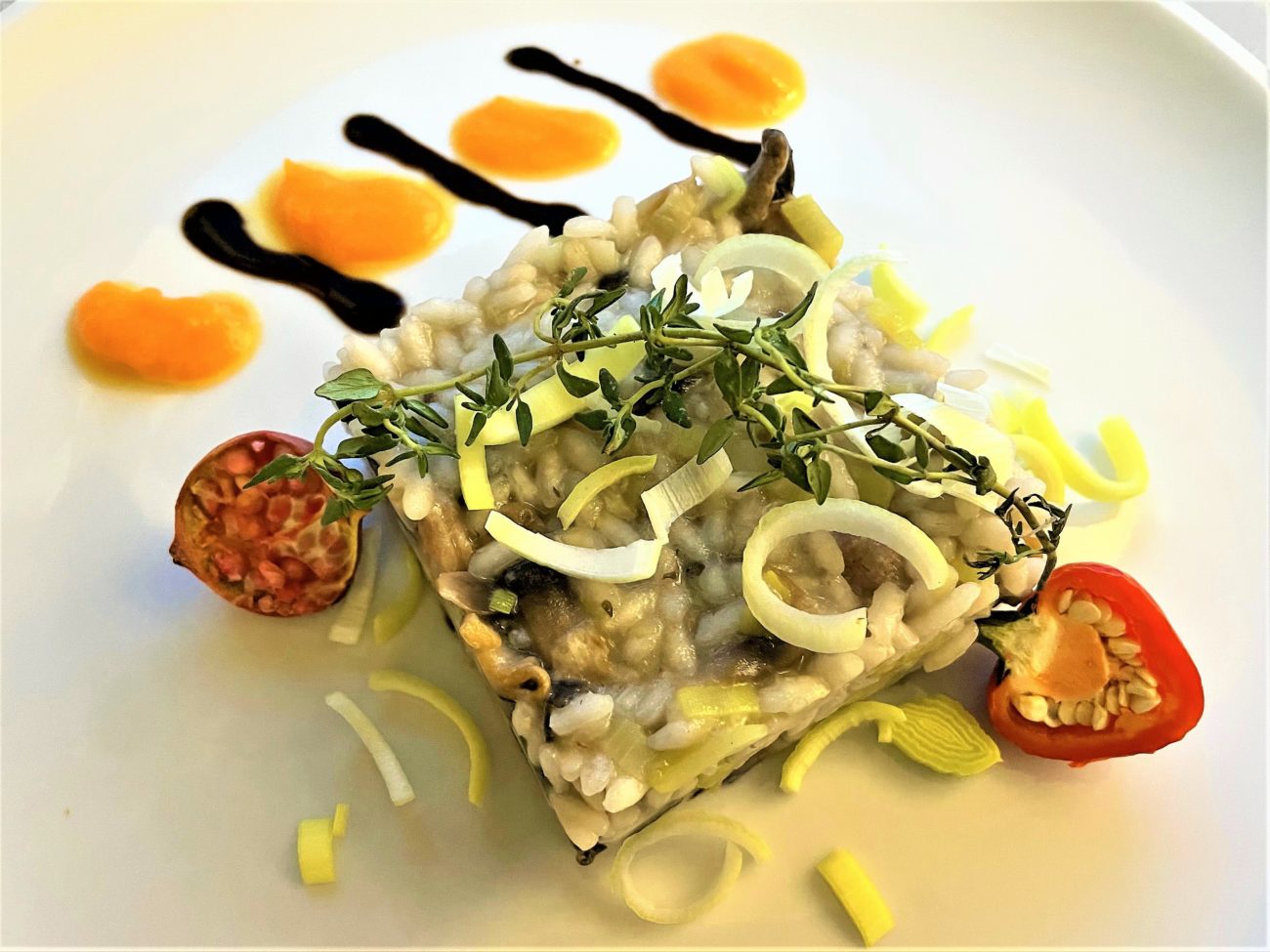 Risotto con salsiccia funghi e porro