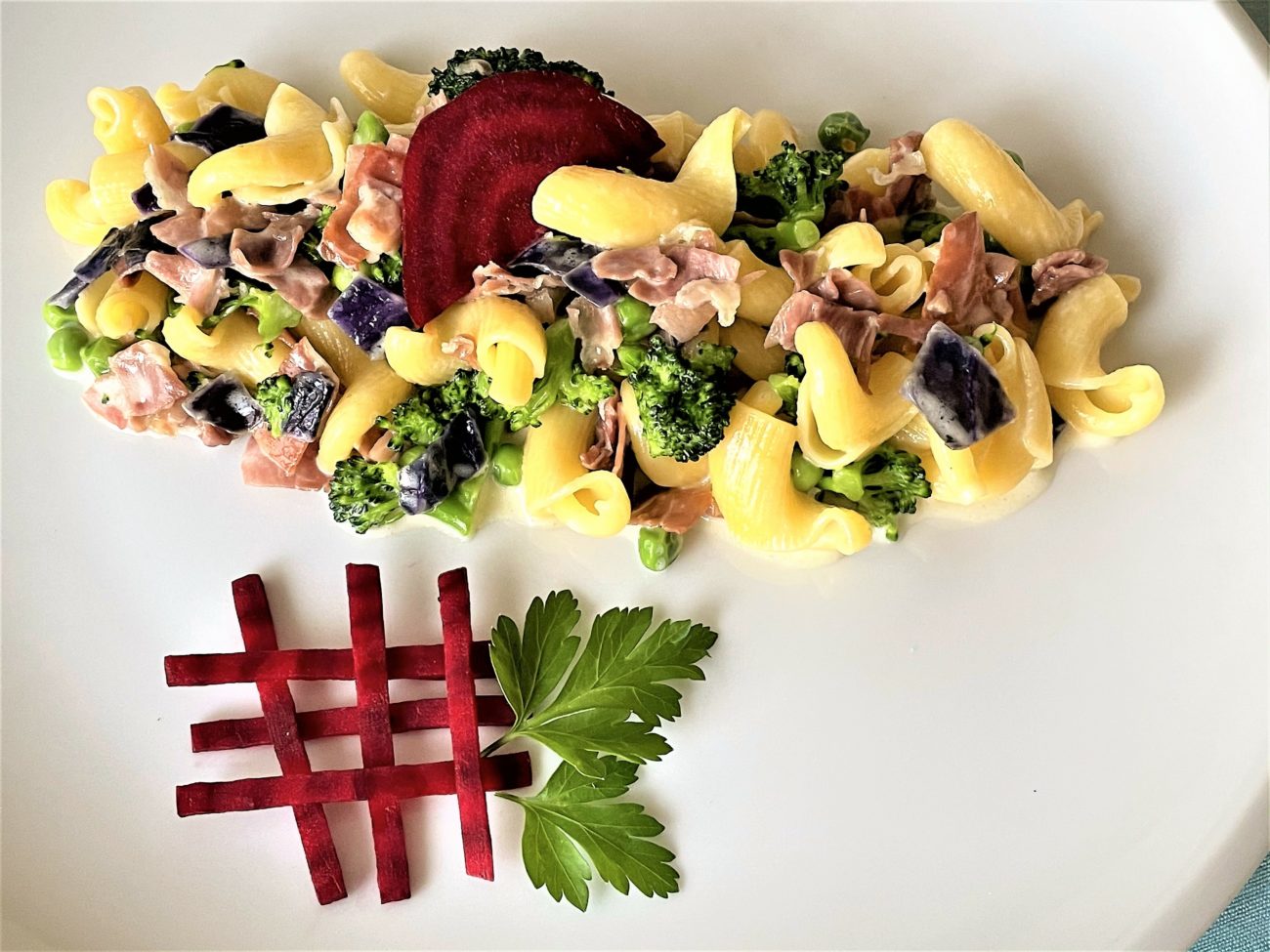 Torcetti con crudo broccoli e piselli