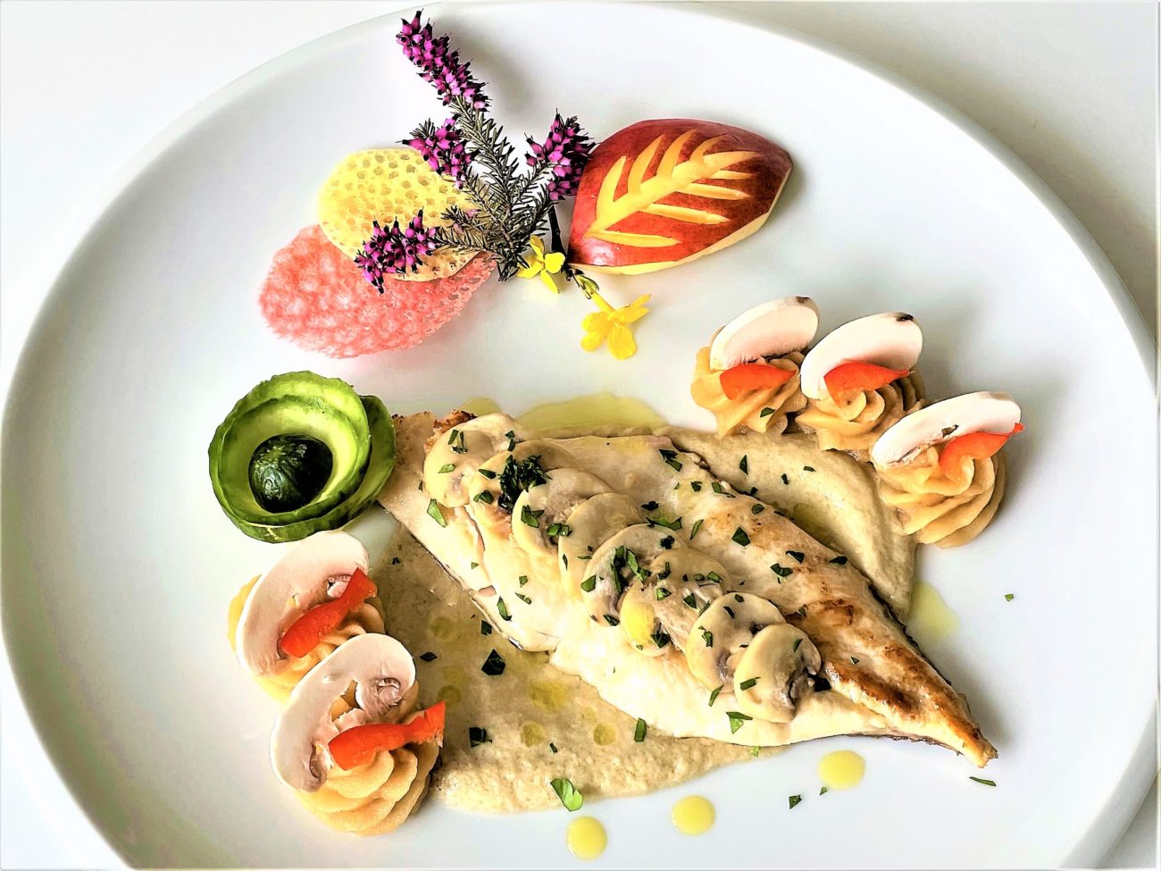 Filetto di branzino ai funghi champignon