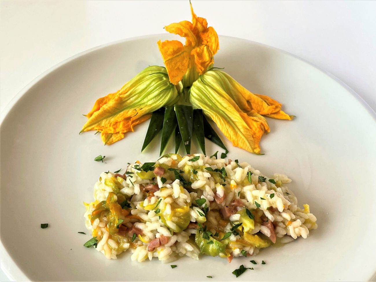 Risotto con speck e fiori di zucca