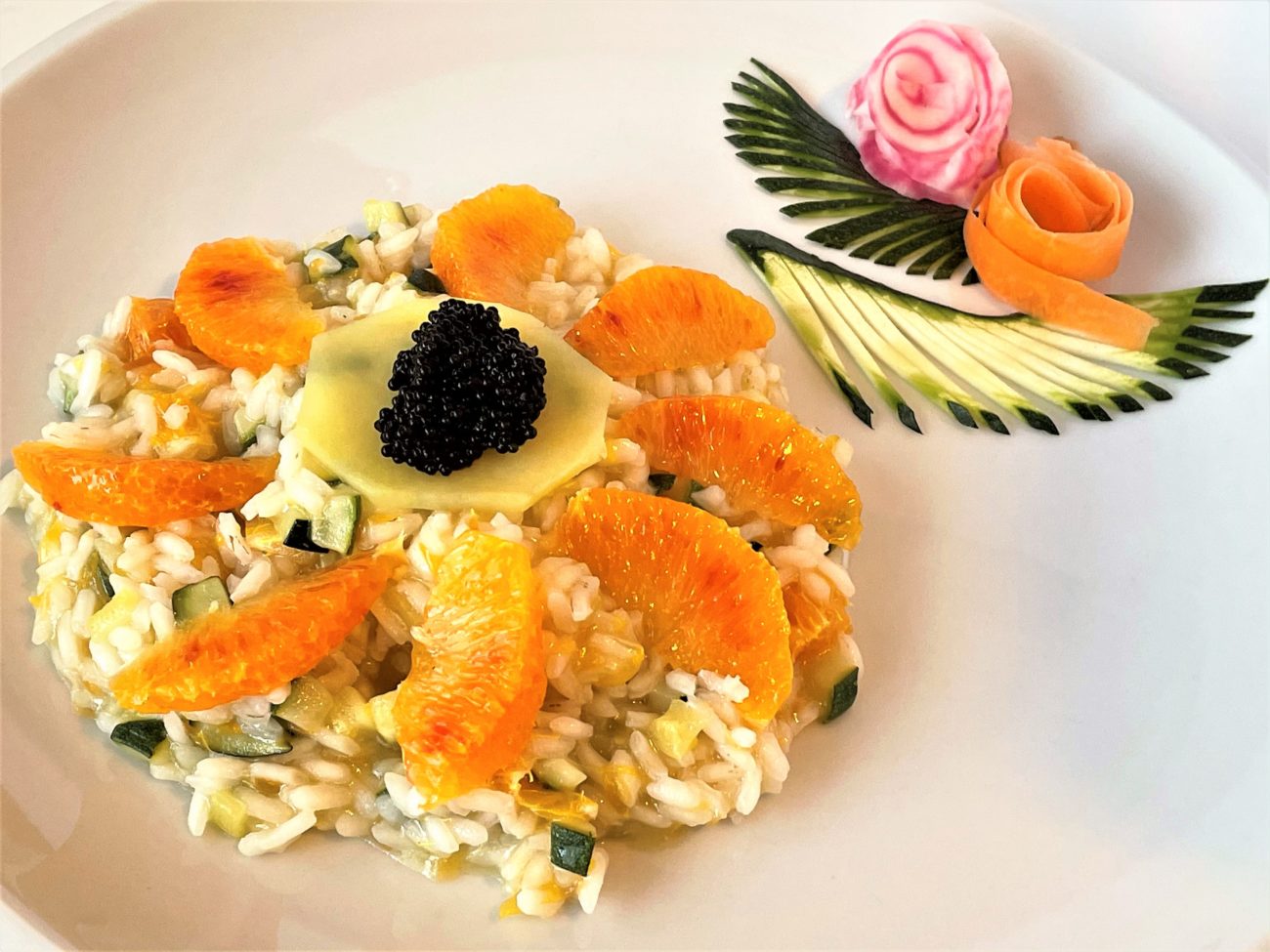 Risotto con zucchine, arancio e caviale