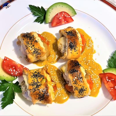 Cappesante-in-pasta-sfoglia-con-salsa-di-curcuma