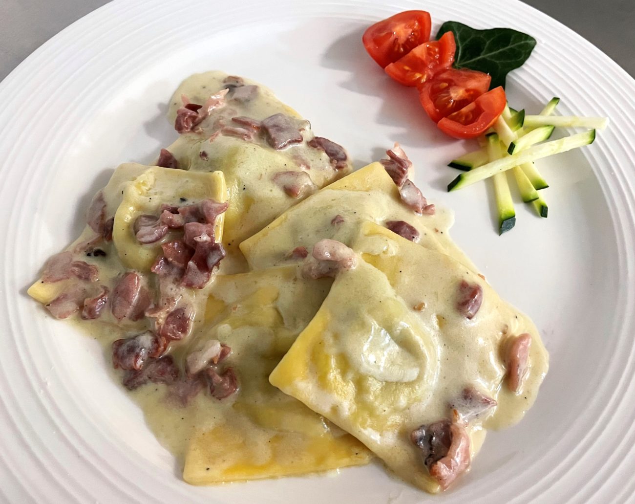 Ravioli di porro allo speck